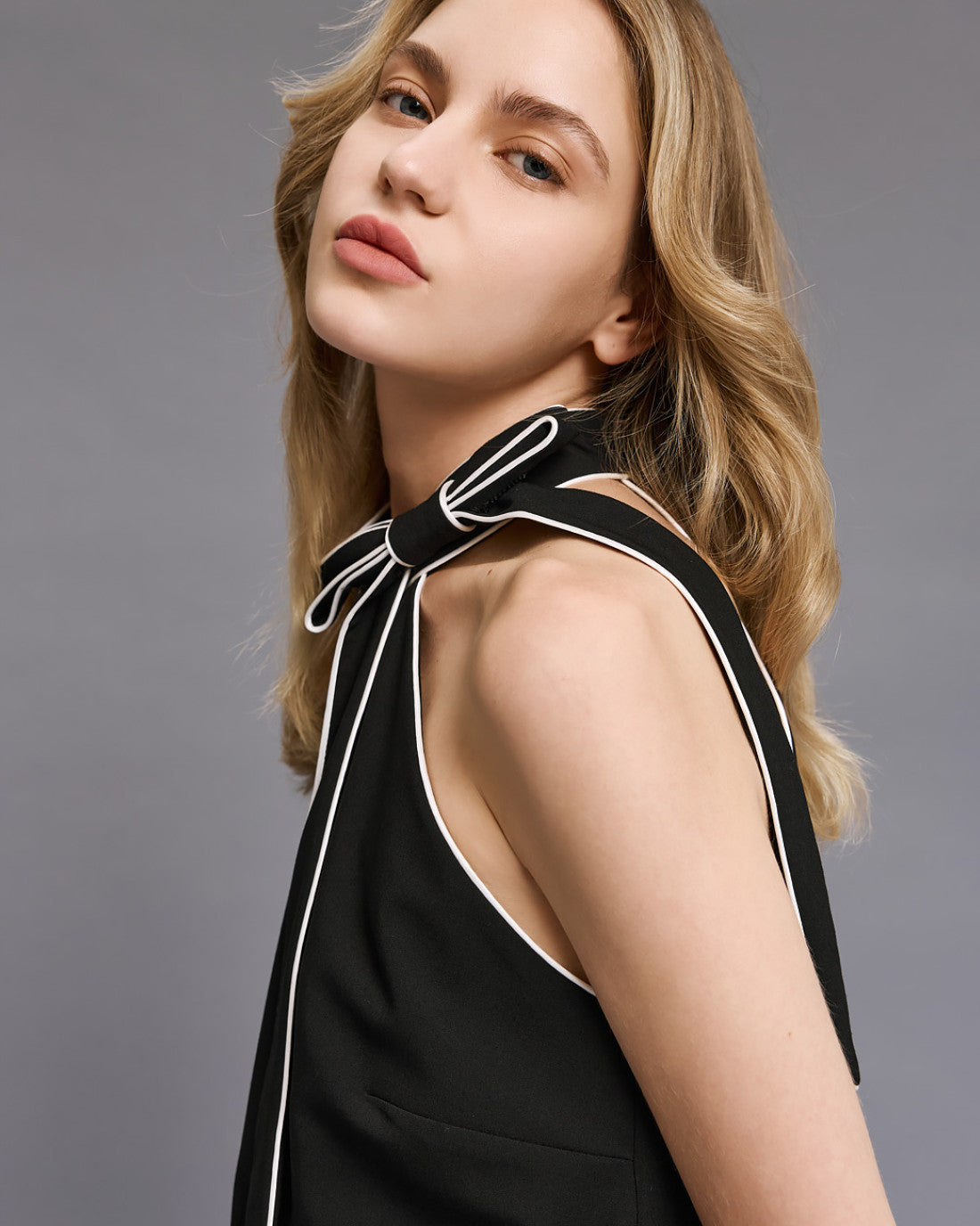 ACCESS Halter top with piping and bow